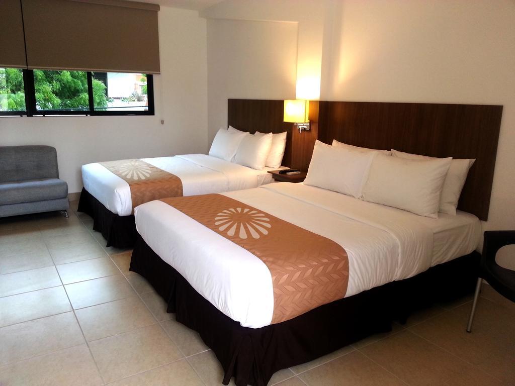 Buenavista Place Hotel Баиа де Каракес Стая снимка